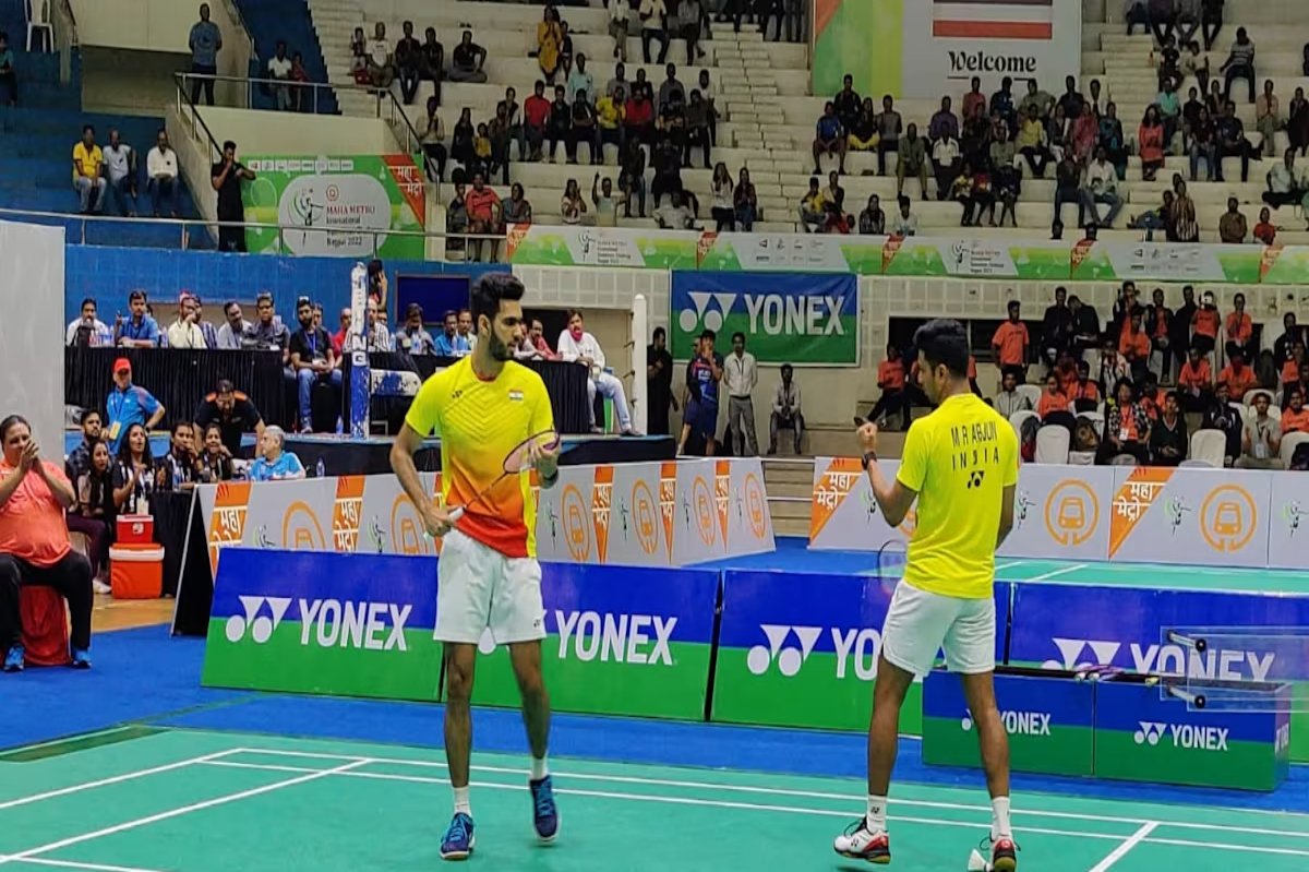 Volleyball team in action during a match with dramatic lighting